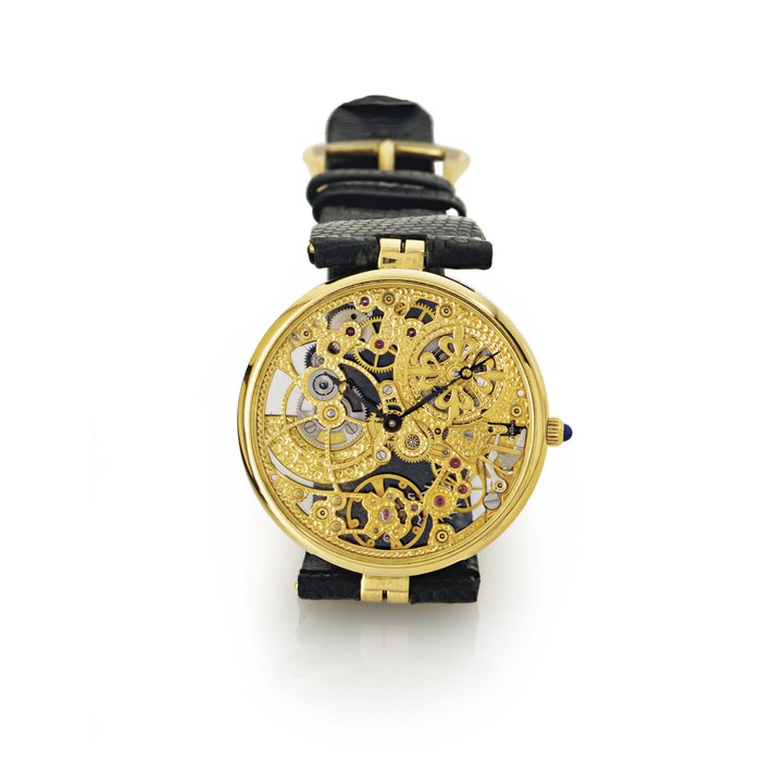 PATEK PHILIPPE. A FINE 18K GOLD AUTOMATIC SKELETONIZED WRISTWATCH SIGNED PATEK PHILIPPE, GENEVE, MOVEMENT NO. 1239064, CASE NO. 2834870, REF. 3878, MANUFACTURED IN 1988