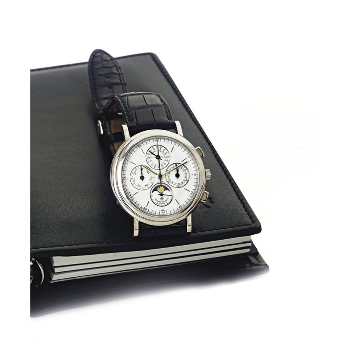 VACHERON CONSTANTIN. A FINE PLATINUM AUTOMATIC PERPETUAL CALENDAR CHRONOGRAPH WRISTWATCH WITH MOON PHASES SIGNED VACHERON CONSTANTIN, GENEVE, MOVEMENT NO. 831796, CASE NO. 641821, REF. 49005/1, CIRCA 1994