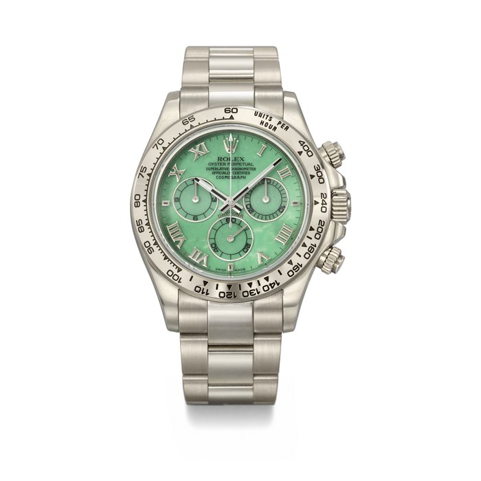 ROLEX. A RARE AND ATTRACTIVE 18K WHITE GOLD AUTOMATIC CHRONOGRAPH WRISTWATCH WITH GREEN CHRYSOPRASE DIAL, BRACELET, GUARANTEE AND BOX SIGNED ROLEX, DAYTONA MODEL, REF. 116509, CASE NO. M924140, CIRCA 2007