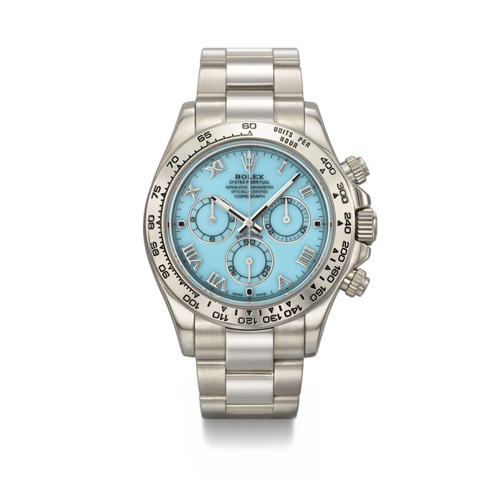 ROLEX. A RARE AND ATTRACTIVE 18K WHITE GOLD AUTOMATIC CHRONOGRAPH WRISTWATCH WITH TURQUOISE DIAL, GUARANTEE AND BOX SIGNED ROLEX, DAYTONA MODEL, REF. 116509, CASE NO. Z971260, CIRCA 2007