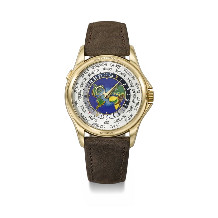PATEK PHILIPPE. A RARE AND ATTRACTIVE 18K GOLD AUTOMATIC WORLD TIME WRISTWATCH WITH CLOISONNÉ ENAMEL DIAL AND BOX SIGNED PATEK PHILIPPE, GENEVE, REF. 5131J-014, MOVEMENT NO. 5'780'877, CASE NO. 6'002'315, CIRCA 2014
