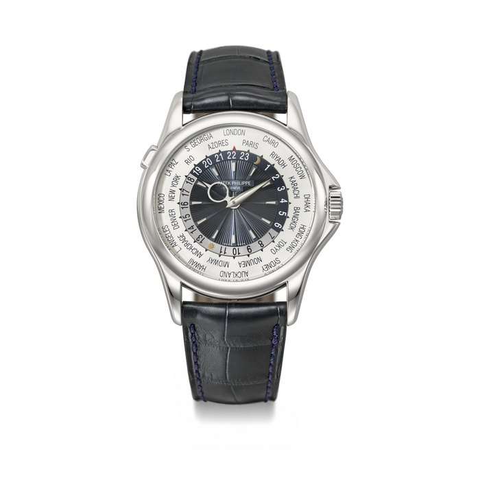 PATEK PHILIPPE. AN ATTRACTIVE PLATINUM AUTOMATIC WORLD TIME WRISTWATCH WITH CERTIFICATE OF ORIGIN AND BOX SIGNED PATEK PHILIPPE, GENEVE, REF. 5130P-020, MOVEMENT NO. 5'893'844, CASE NO. 6'005'887, CIRCA 2015