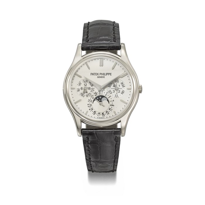 PATEK PHILIPPE. A 18K WHITE GOLD AUTOMATIC PERPETUAL CALENDAR WRISTWATCH WITH MOON PHASES, 24 HOUR, LEAP YEAR INDICATION , ADDITIONAL CASE BACK, CERTIFICATE OF ORIGIN AND BOX SIGNED PATEK PHILIPPE, GENEVE, REF. 5140G-001, MOVEMENT NO. 5'852'130, CASE NO. 6'014'340, CIRCA 2014