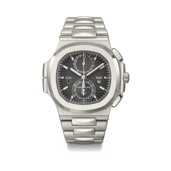 PATEK PHILIPPE. A LARGE AND ATTRACTIVE STAINLESS STEEL AUTOMATIC FLYBACK CHRONOGRAPH DUAL TIME WRISTWATCH WITH DAY/NIGHT INDICATOR, DATE, BRACELET, CERTIFICATE OF ORIGIN AND BOX SIGNED PATEK PHILIPPE, GENEVE, NAUTILUS MODEL, REF. 5990⁄1A-001, MOVEMENT NO. 5'969'760, CASE NO. 6'097'444, CIRCA 2017