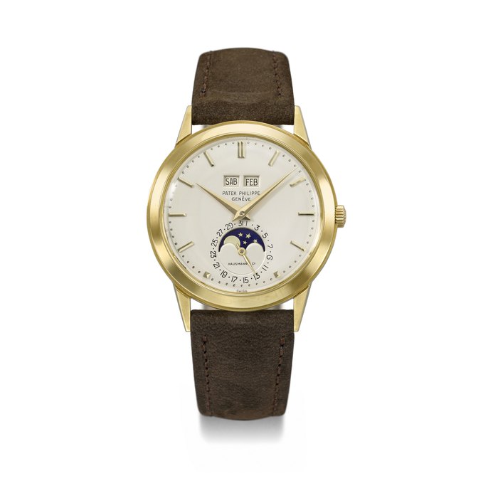 Patek Philippe PATEK PHILIPPE. A VERY FINE AND RARE 18K GOLD AUTOMATIC PERPETUAL CALENDAR WRISTWATCH WITH PHASES OF THE MOON SIGNED PATEK PHILIPPE, GENEVE, RETAILED BY HAUSMANN & CO., REF. 3448, MOVEMENT NO. 1'119’147, CASE NO. 325’503, MANUFACTURED IN 1970, Price & Market Data