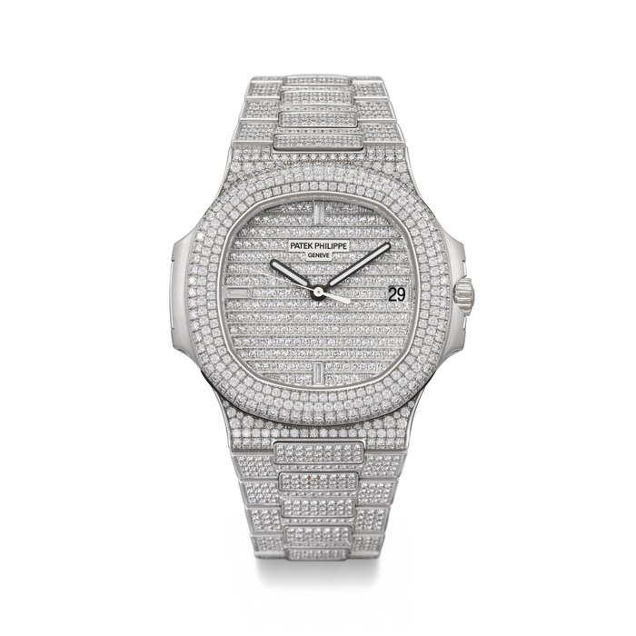 PATEK PHILIPPE. AN EXCEPTIONAL, VERY RARE AND MAGNIFICENT 18K WHITE GOLD AND PAVÉ DIAMOND-SET AUTOMATIC WRISTWATCH WITH DATE, PAVE-SET DIAMOND DIAL, PAVÉ DIAMOND-SET BRACELET, CERTIFICATE OF ORIGIN AND BOX SIGNED PATEK PHILIPPE, GENÈVE, NAUTILUS MODEL, REF. 5719/1G-001, CIRCA 2016