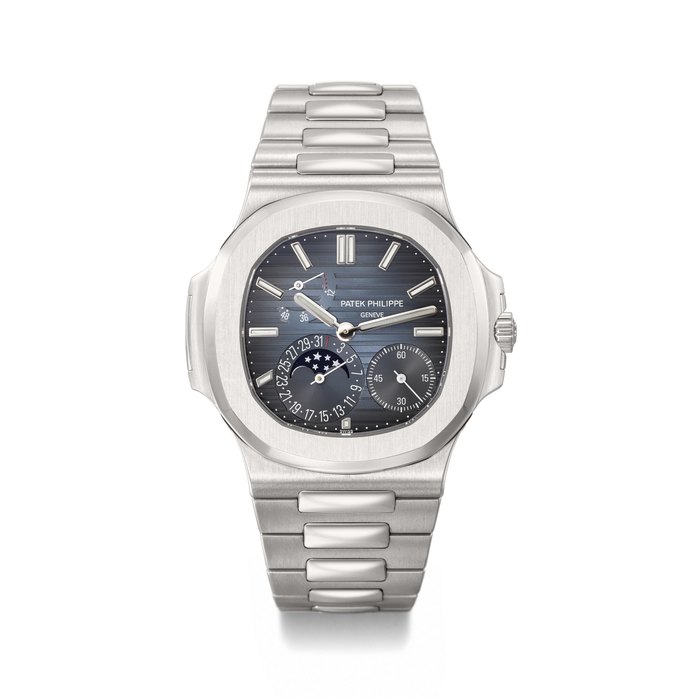 PATEK PHILIPPE. AN ATTRACTIVE STAINLESS STEEL AUTOMATIC WRISTWATCH WITH DATE, MOON PHASES, POWER RESERVE, BRACELET, CERTIFICATE OF ORIGIN AND BOX SIGNED PATEK PHILIPPE, GENEVE, NAUTILUS MODEL, REF. 5712/1A-001, MOVEMENT NO. 7'003'520, CASE NO. 6'140'966, CIRCA 2017