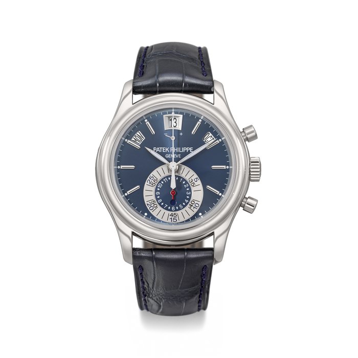 PATEK PHILIPPE. AN ATTRACTIVE PLATINUM AUTOMATIC ANNUAL CALENDAR FLYBACK CHRONOGRAPH WRISTWATCH WITH POWER RESERVE, DAY/NIGHT INDICATOR, CERTIFICATE OF ORIGIN AND BOX SIGNED PATEK PHILIPPE, GENEVE, REF. 5960P-015, MOVEMENT NO. 5'765'402, CASE NO. 4’633'840, CIRCA 2014