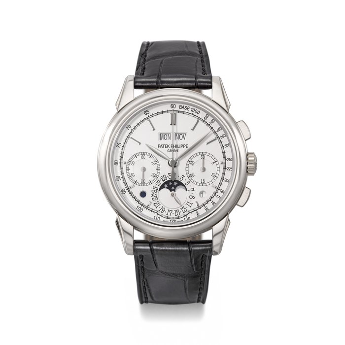 PATEK PHILIPPE. A RARE 18K WHITE GOLD PERPETUAL CALENDAR CHRONOGRAPH WRISTWATCH WITH MOON PHASES, LEAP YEAR, DAY/NIGHT INDICATOR, CERTIFICATE OF ORIGIN AND BOX SIGNED PATEK PHILIPPE, GENEVE, REF. 5270G-013, MOVEMENT NO. 5'762'281, CASE NO. 4'691'290, CIRCA 2014