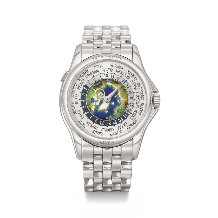 PATEK PHILIPPE. A VERY RARE AND HIGHLY ATTRACTIVE PLATINUM AUTOMATIC WORLD TIME WRISTWATCH WITH BRACELET, 'NORTH POLE' CLOISONNÉ ENAMEL DIAL, CERTIFICATE OF ORIGIN AND BOX SIGNED PATEK PHILIPPE, GENEVE, WORLD TIME MODEL, REF. 5131/1P-001, CIRCA 2017