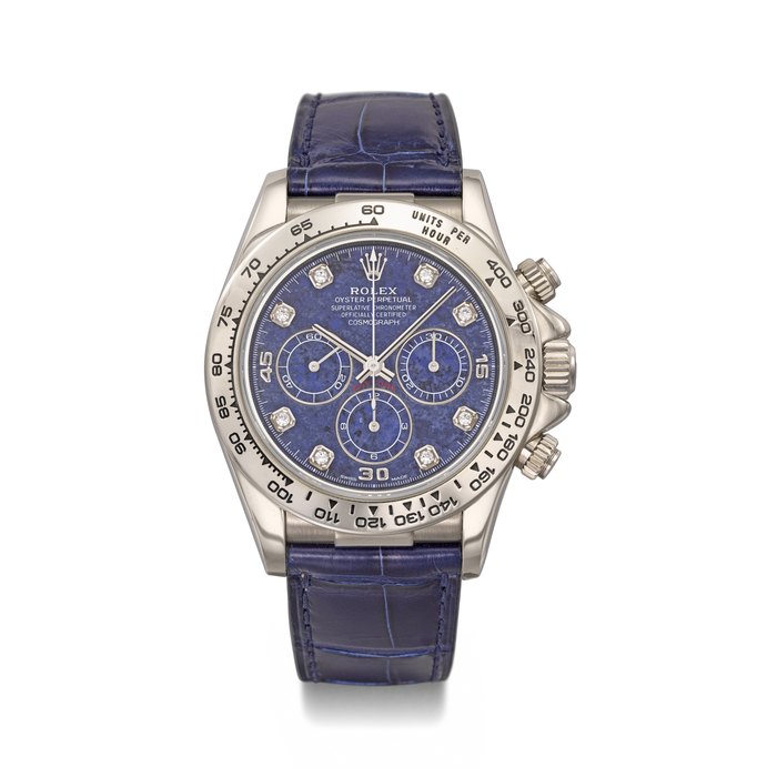 ROLEX. A VERY RARE AND ATTRACTIVE 18K WHITE GOLD AND DIAMOND-SET AUTOMATIC CHRONOGRAPH WRISTWATCH WITH SODALITE DIAL, GUARANTEE AND BOX SIGNED ROLEX, DAYTONA MODEL, REF. 16519, CASE NO. A207411, CIRCA 1999
