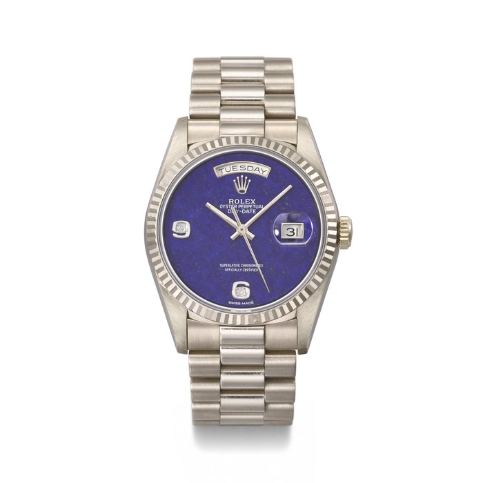 ROLEX. A RARE AND ATTRACTIVE 18K WHITE GOLD AND DIAMOND-SET AUTOMATIC WRISTWATCH WITH SWEEP CENTRE SECONDS, DAY, DATE, LAPIS LAZULI DIAL AND BRACELET SIGNED ROLEX, DAY-DATE MODEL, REF. 18239, CASE NO X258488, CIRCA 1991