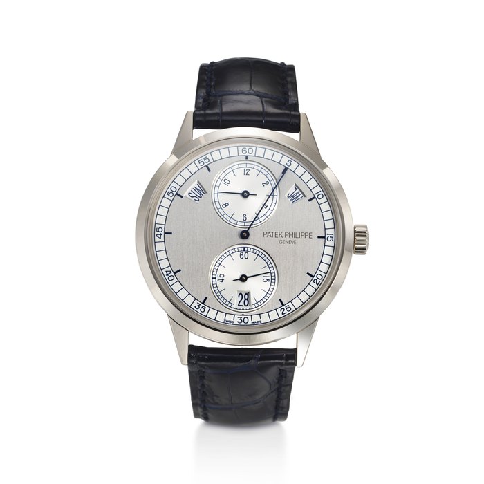 PATEK PHILIPPE, REF. 5235G-001, A FINE 18K WHITE GOLD ANNUAL CALENDAR REGULATOR DISPLAY WRISTWATCH
