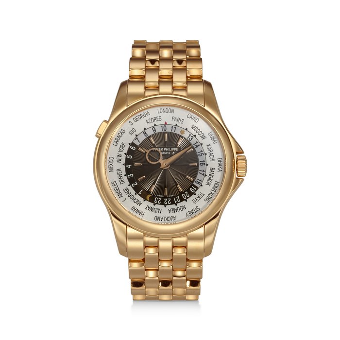 PATEK PHILIPPE, REF. 5130/1R-001, A VERY FINE 18K ROSE GOLD WORLD TIME WRISTWATCH WITH GUILLOCHE DIAL ON BRACELET