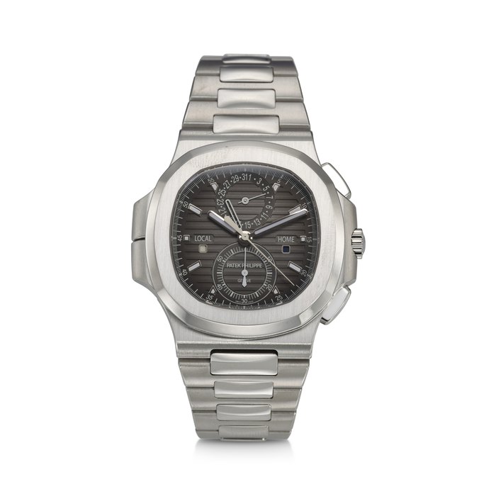 PATEK PHILIPPE, REF. 5990/1A-001, NAUTILUS, A FINE STEEL DUAL TIME FLY-BACK CHRONOGRAPH WRISTWATCH