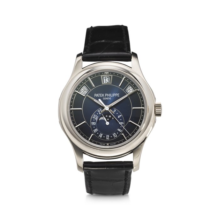 PATEK PHILIPPE, REF. 5205G-013, A FINE 18K WHITE GOLD ANNUAL CALENDAR WRISTWATCH WITH MOON PHASES