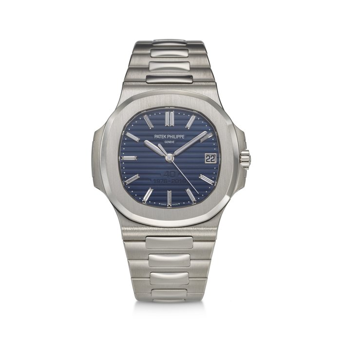PATEK PHILIPPE, REF. 5711/1P-001, NAUTILUS 40th ANNIVERSARY, A VERY FINE AND RARE LIMITED SERIES PLATINUM WRISTWATCH WITH DATE & DIAMOND HOUR MARKERS