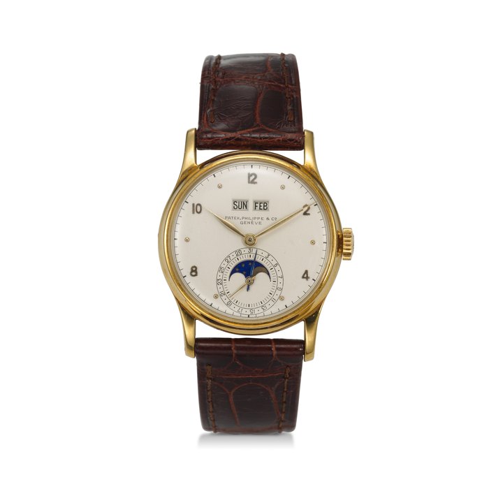 PATEK PHILIPPE, REF. 1526J, A FINE AND RARE 18K YELLOW GOLD PERPETUAL CALENDAR WRISTWATCH WITH MOON PHASES