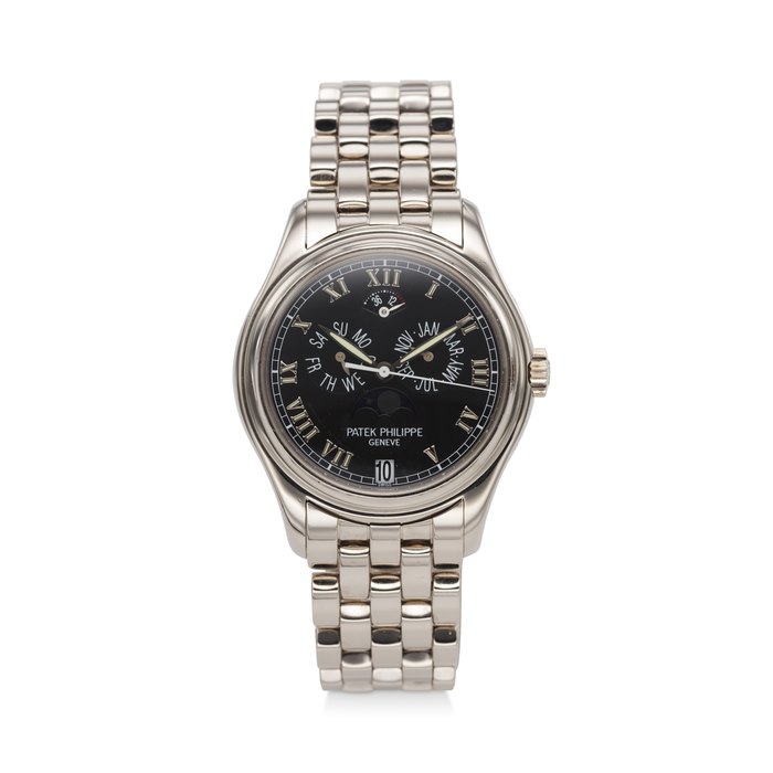 PATEK PHILIPPE, REF. 5036/1G-013, A FINE 18K WHITE GOLD ANNUAL CALENDAR WRISTWATCH WITH MOON PHASES AND POWER RESERVE