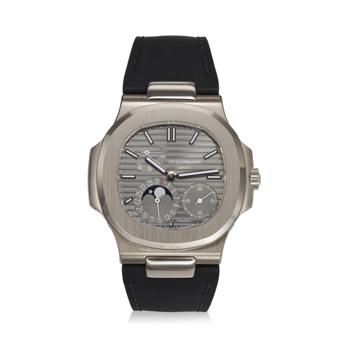PATEK PHILIPPE, REF. 5712G-001, NAUTILUS, A VERY FINE 18K WHITE GOLD WRISTWATCH WITH POWER RESERVE, MOON PHASES, AND DATE, SIGNED AND RETAILED BY TIFFANY & CO.