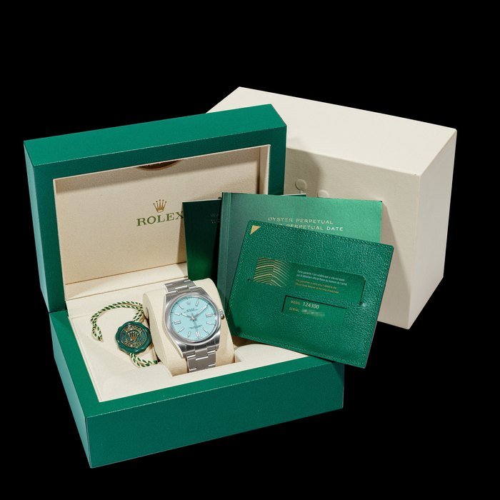 Rolex ROLEX. A STAINLESS STEEL AUTOMATIC WRISTWATCH WITH SWEEP CENTRE SECONDS AND BRACELET OYSTER PERPETUAL, REF. 124300, CIRCA 2020 · 124300