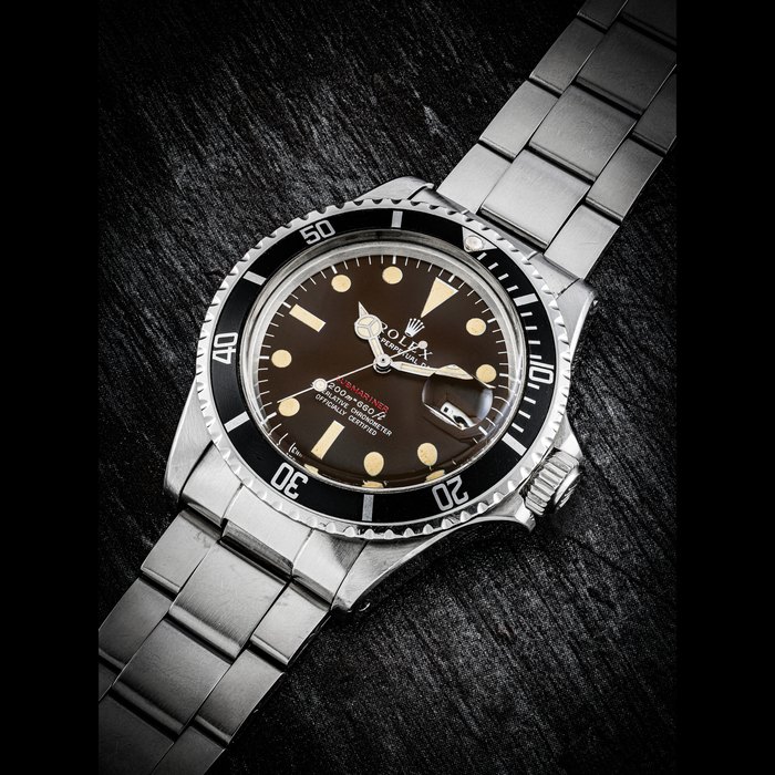 ROLEX. A STAINLESS STEEL AUTOMATIC WRISTWATCH WITH SWEEP CENTRE SECONDS, DATE, BRACELET AND TROPICAL DIAL SUBMARINER DATE MODEL, REF. 1680