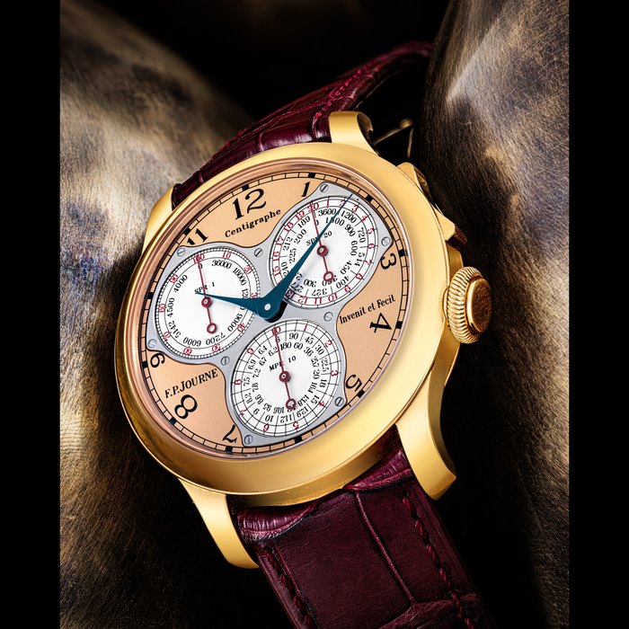 F.P. JOURNE. AN 18K PINK GOLD ERGONOMIC CHRONOGRAPH WRISTWATCH WITH 100 TH OF A SECOND, 20 TH SECONDS AND 10 MINUTE REGISTERS CENTIGRAPHE SOUVERAIN MODEL, CIRCA 2009