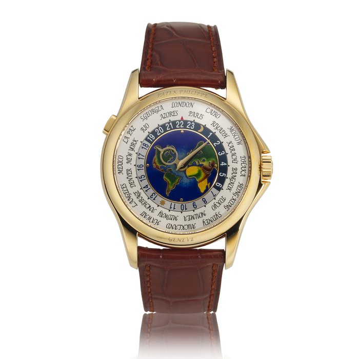 PATEK PHILIPPE. AN 18K GOLD AUTOMATIC WORLD TIME WRISTWATCH WITH CLOISONNÉ ENAMEL DIAL REF. 5131J, CIRCA 2014