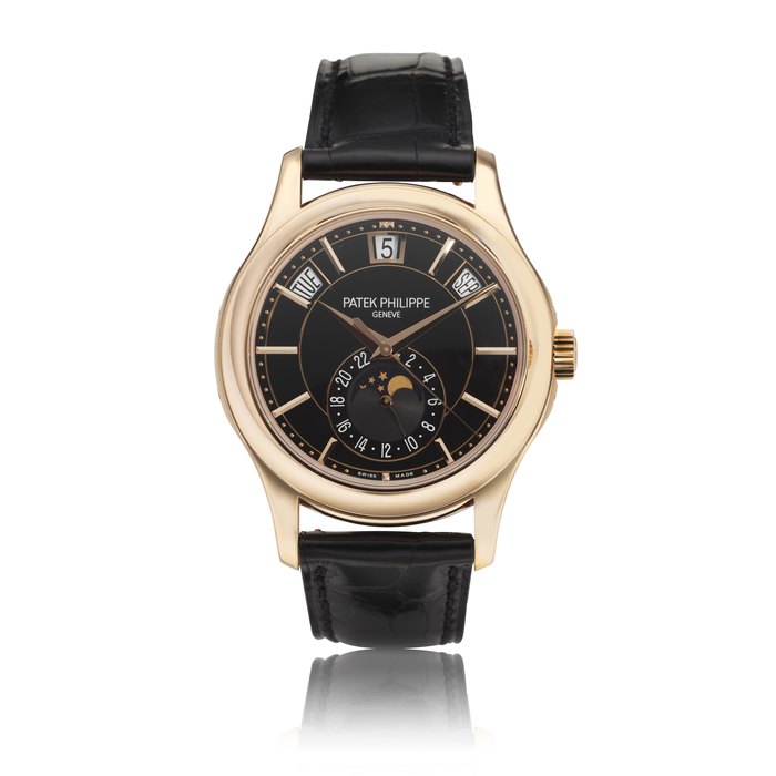 PATEK PHILIPPE. AN 18K PINK GOLD AUTOMATIC ANNUAL CALENDAR WRISTWATCH WITH SWEEP CENTRE SECONDS, MOON PHASES AND 24 HOUR INDICATION REF. 5205R, CIRCA 2014
