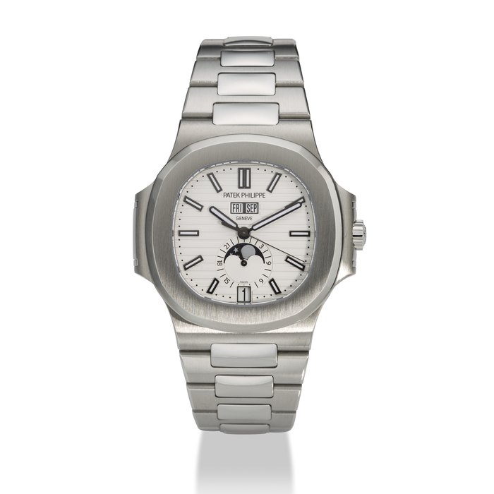 PATEK PHILIPPE. A STAINLESS STEEL AUTOMATIC ANNUAL CALENDAR WRISTWATCH WITH SWEEP CENTRE SECONDS, MOON PHASES, 24 HOUR INDICATION AND BRACELET NAUTILUS MODEL, REF. 5726⁄1A, CIRCA 2013