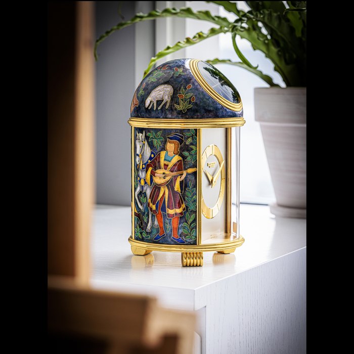PATEK PHILIPPE. A UNIQUE GILT BRASS SOLAR POWERED DOME CLOCK WITH CLOISONNÉ ENAMEL