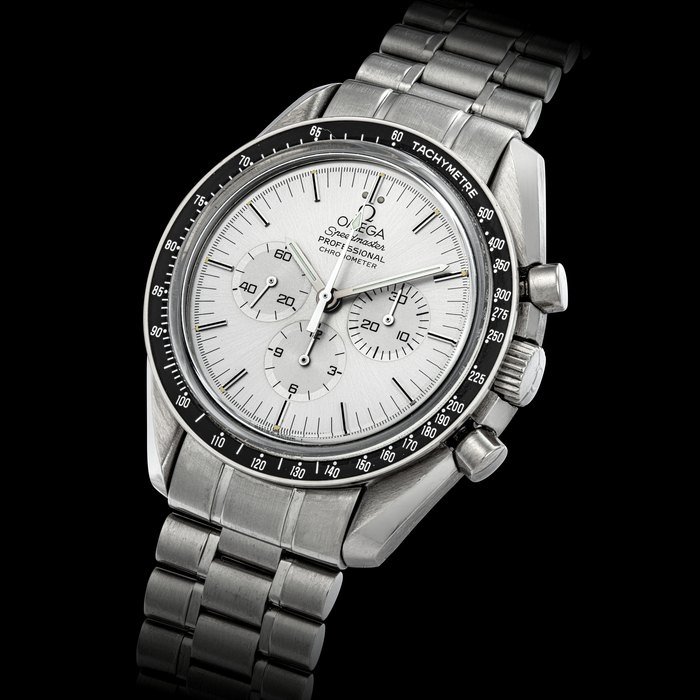 Omega OMEGA. A RARE 18K WHITE GOLD LIMITED EDITION CHRONOGRAPH WRISTWATCH WITH BRACELET, MADE TO COMMEMORATE THE 25 TH ANNIVERSARY OF MOON LANDING SPEEDMASTER PROFESSIONAL MODEL, APOLLO XI 1969-1994, SOLD IN 1994