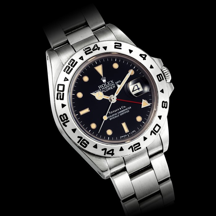 Rolex ROLEX. A RARE STAINLESS STEEL AUTOMATIC DUAL TIME WRISTWATCH WITH SWEEP CENTRE SECONDS, DATE AND BRACELET, RETAILED BY TIFFANY & CO. EXPLORER II MODEL, REF. 16550, Price & Market Data