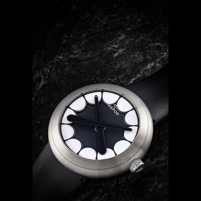 IKEPOD X KAWS. A RARE TITANIUM AUTOMATIC WRISTWATCH DESIGNED BY MARC NEWSON