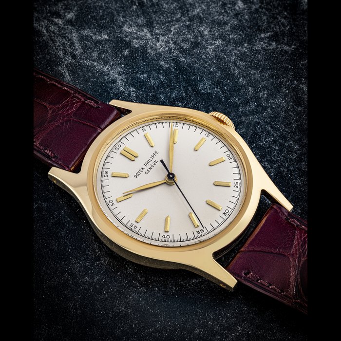 PATEK PHILIPPE. AN 18K GOLD WRISTWATCH WITH SWEEP CENTRE SECONDS REF. 565, MANUFACTURED IN 1951