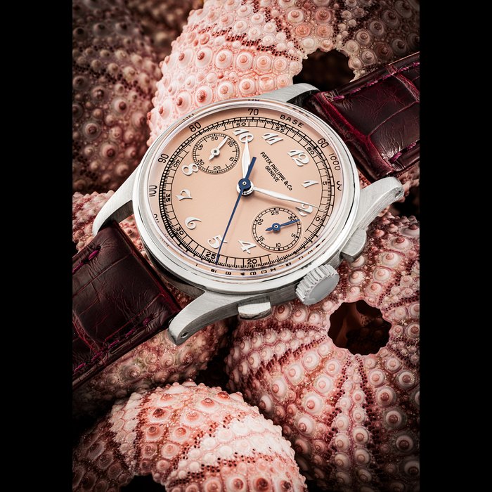 Patek Philippe PATEK PHILIPPE. AN EXCEPTIONALLY ATTRACTIVE AND VERY RARE STAINLESS STEEL CHRONOGRAPH WRISTWATCH WITH PINK DIAL AND BREGUET NUMERALS REF. 130, MANUFACTURED IN 1941, Price & Market Data