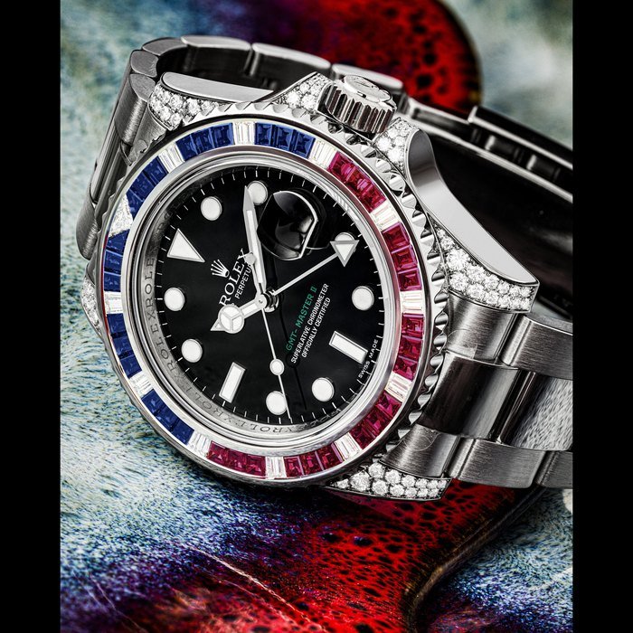 Rolex ROLEX. A RARE 18K WHITE GOLD, DIAMOND, RUBY AND SAPPHIRE-SET AUTOMATIC DUAL TIME WRISTWATCH WITH SWEEP CENTRE SECONDS, DATE AND BRACELET GMT MASTER II 'SARU' MODEL, REF. 116759SARU, CIRCA 2016 · 116759SARU