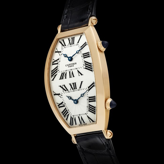 CARTIER. AN 18K PINK GOLD TONNEAU-SHAPED DUAL TIME WRISTWATCH REF. 2805 H, CIRCA 2005