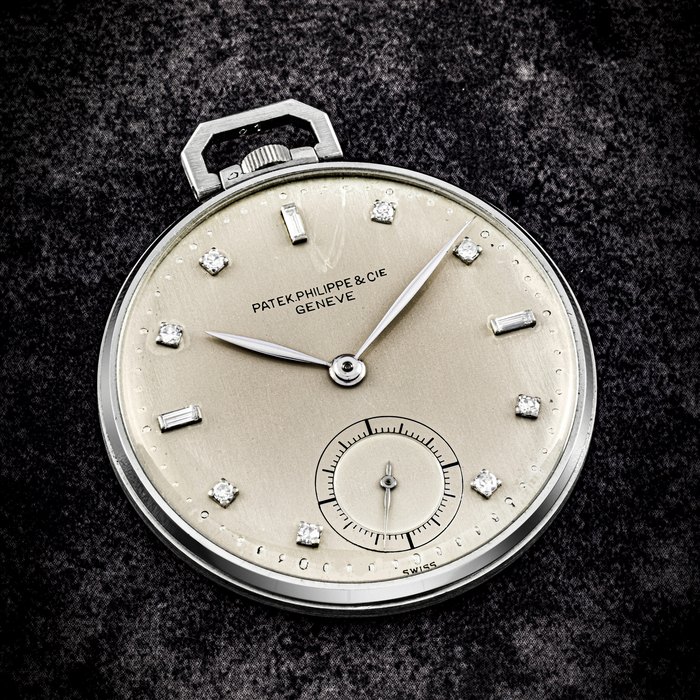 PATEK PHILIPPE. A PLATINUM AND DIAMOND-SET POCKET WATCH REF. 600, MANUFACTURED IN 1946