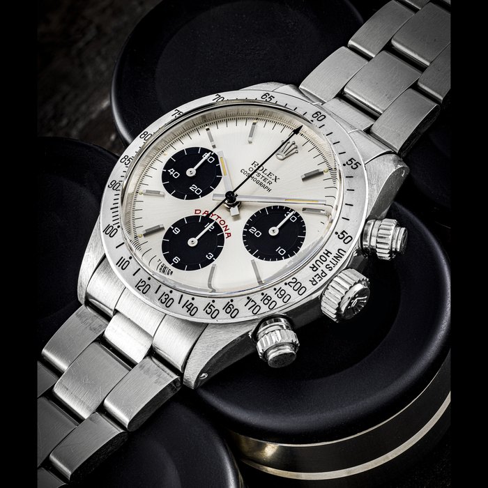 Rolex ROLEX. A STAINLESS STEEL CHRONOGRAPH WRISTWATCH WITH BRACELET DAYTONA MODEL, “BIG RED”, REF. 6265, Price & Market Data