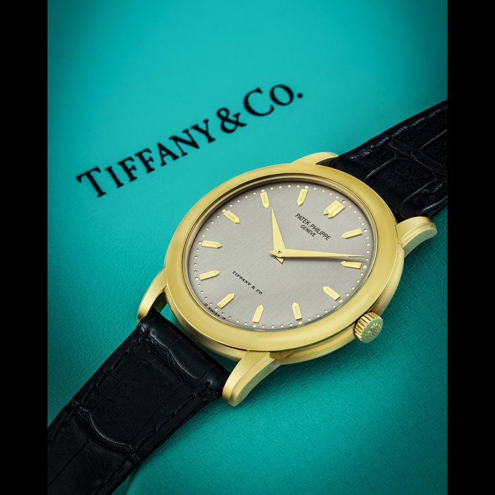 PATEK PHILIPPE. A RARE 18K GOLD AUTOMATIC WRISTWATCH , RETAILED BY TIFFANY & CO. CALATRAVA MODEL, REF. 5032J, MANUFACTURED IN 1995