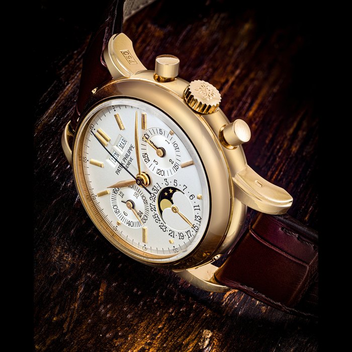 PATEK PHILIPPE. A VERY RARE 18K PINK GOLD PERPETUAL CALENDAR CHRONOGRAPH WRISTWATCH WITH MOON PHASES, 24 HOUR AND LEAP YEAR INDICATION REF. 3971ER, MANUFACTURED IN 1989