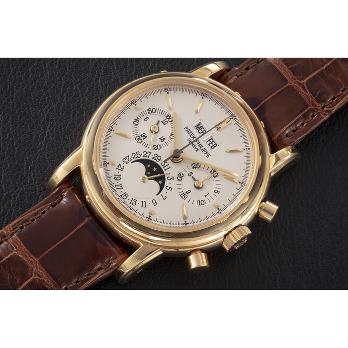 PATEK PHILIPPE, REF. 3970E 'FOURTH SERIES', A GOLD PERPETUAL CALENDAR CHRONOGRAPH WRISTWATCH CASE NUMBER: 2’968’258, MOVEMENT NUMBER: 3’045’418