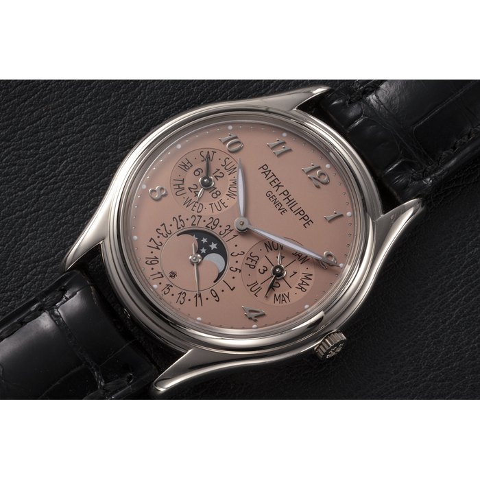 PATEK PHILIPPE REF. 3940G ‘MICHAEL OVITZ’, A UNIQUE GOLD PERPETUAL CALENDAR WITH CUSTOM PINK GOLD DIAL CASE NUMBER: 4’369’797 MOVEMENT NUMBER: 5’703’495