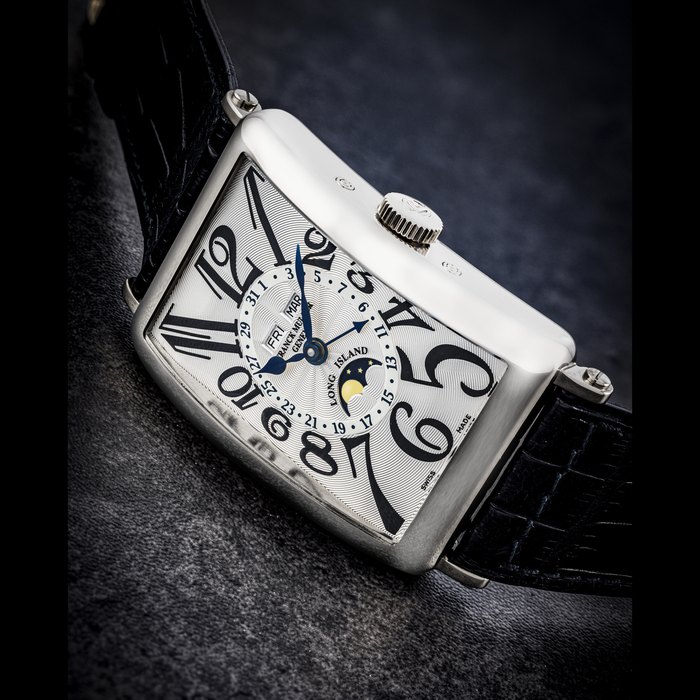 FRANCK MULLER. AN 18K WHITE GOLD AUTOMATIC TRIPLE CALENDAR WRISTWATCH WITH MOON PHASES LONG ISLAND MASTER CALENDAR MODEL, CIRCA 2003