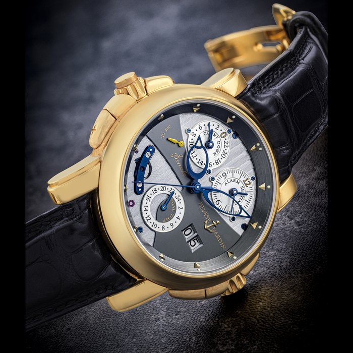 ULYSSE NARDIN. AN 18K GOLD AUTOMATIC DUAL TIME WRISTWATCH WITH SWEEP CENTRE SECONDS, DATE, ALARM AND COUNTDOWN INDICATION SONATA MODEL, REF. 666-88