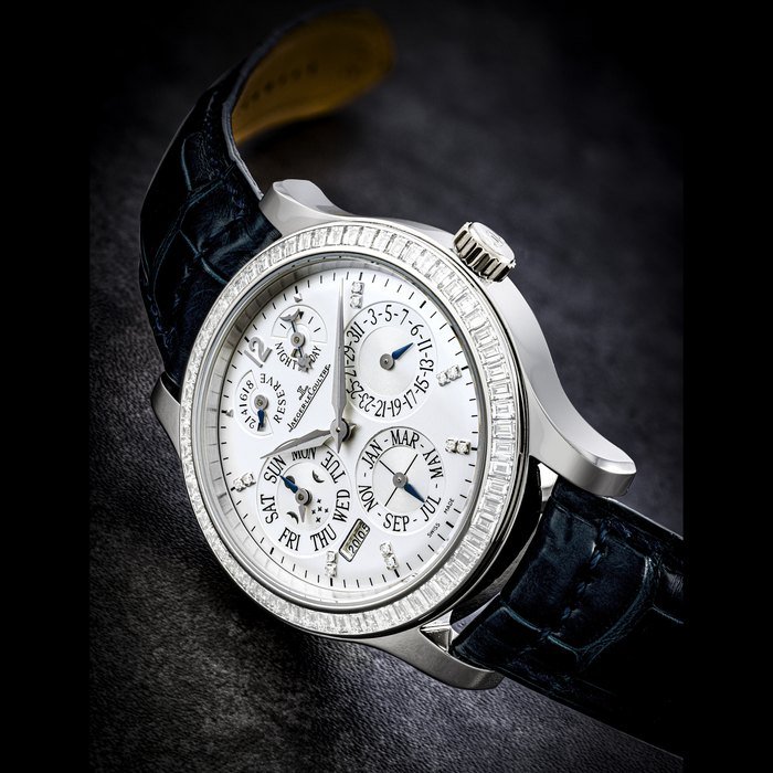 Jaeger-Lecoultre JAEGER-LECOULTRE. A PLATINUM AND CALIBRE-CUT DIAMOND-SET PERPETUAL CALENDAR WRISTWATCH WITH DIGITAL YEAR DISPLAY, DAY/NIGHT, ADJUSTMENT WARNING INDICATOR, 8-DAYS POWER RESERVE AND MOON PHASES MASTER CONTROL 8-DAYS PERPETUAL MODEL, REF. 146.6.26.S