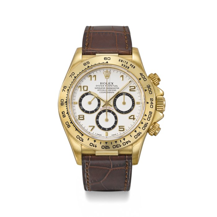ROLEX. A RARE AND ATTRACTIVE 18K GOLD AUTOMATIC CHRONOGRAPH WRISTWATCH WITH BOX SIGNED ROLEX, DAYTONA MODEL, REF. 16518, CASE NO. S450073, CIRCA 1993