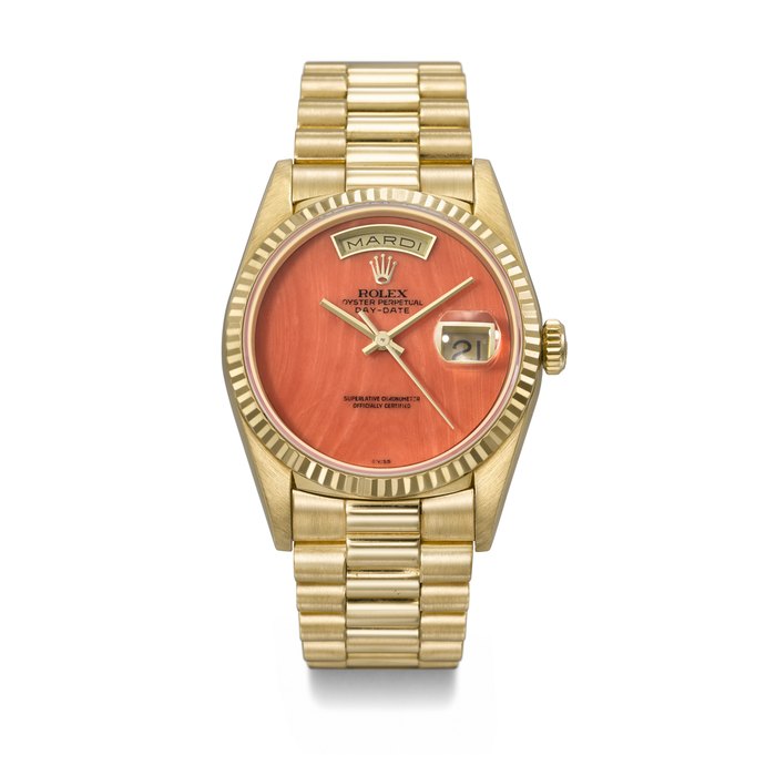 ROLEX. A RARE AND HIGHLY ATTRACTIVE 18K GOLD AUTOMATIC WRISTWATCH WITH SWEEP CENTRE SECONDS, DAY, DATE, CORAL DIAL AND BRACELET SIGNED ROLEX, DAY-DATE MODEL, REF. 18238, CASE NO. E328511, CIRCA 1990