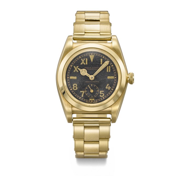 ROLEX. A RARE AND HIGHLY ATTRACTIVE 18K GOLD AUTOMATIC WRISTWATCH WITH CALIFORNIA DIAL AND BRACELET SIGNED ROLEX, BUBBLEBACK MODEL, REF. 3130, CASE NO. 3120, CIRCA 1945